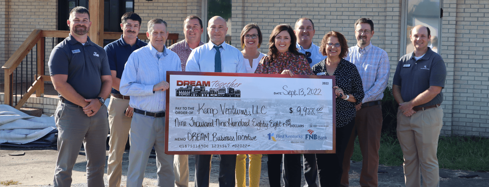 DREAM Together Funds Check Presentation Held at Kemp Ventures LLC