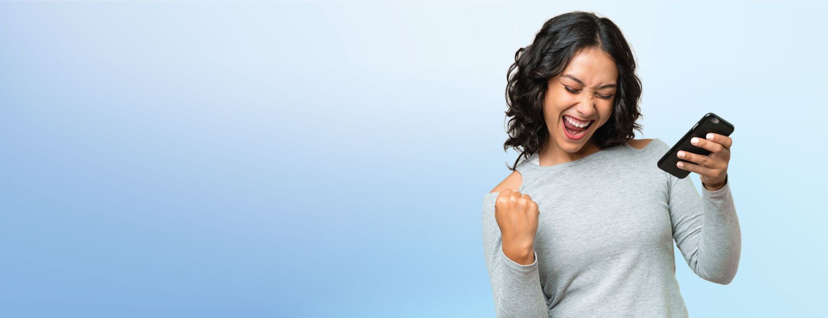 Excited Woman with Cellphone