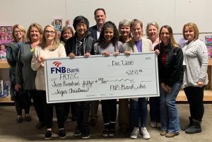 FNB makes $250 Christmas donation to Tiger Christmas