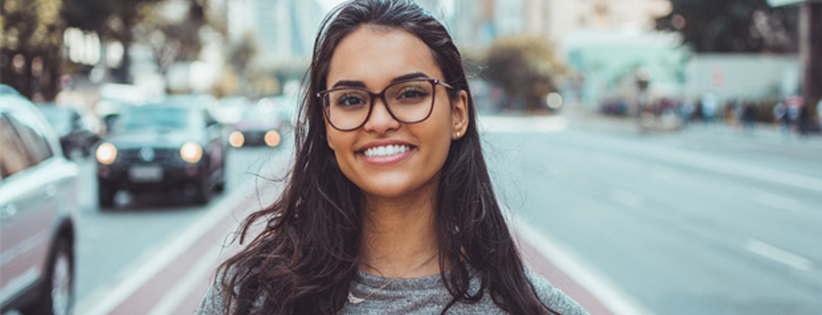Woman in Glasses Smiling