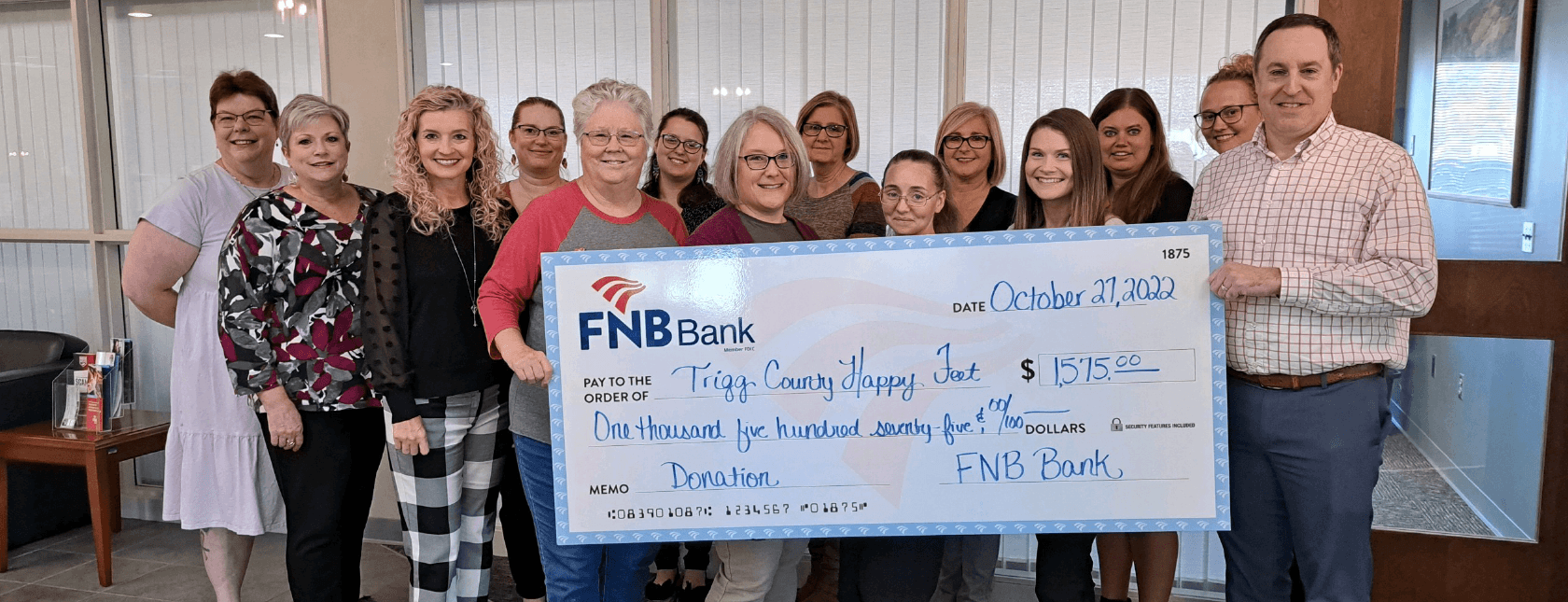 FNB Presents Check for $1,575 to Trigg County Happy Feet
