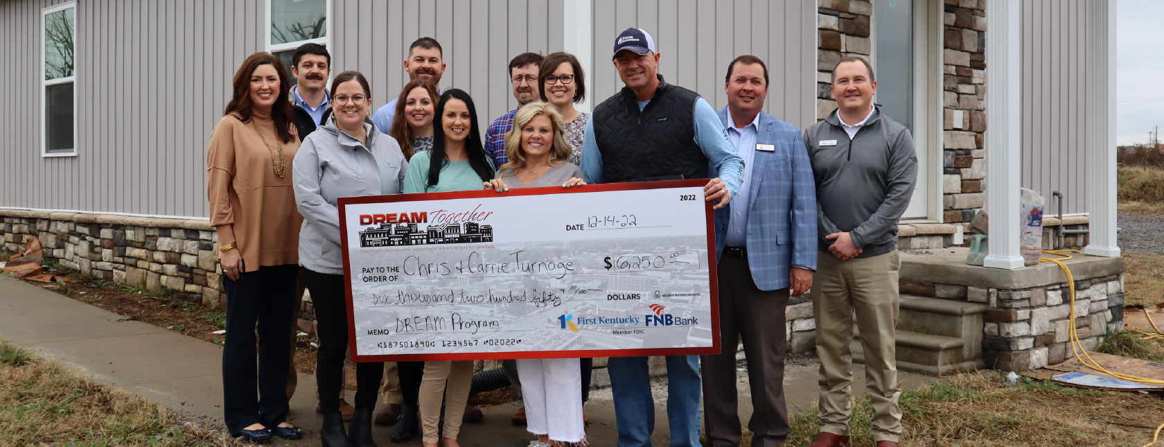 DREAM Check Presentation Held for Chris & Carrie Turnage